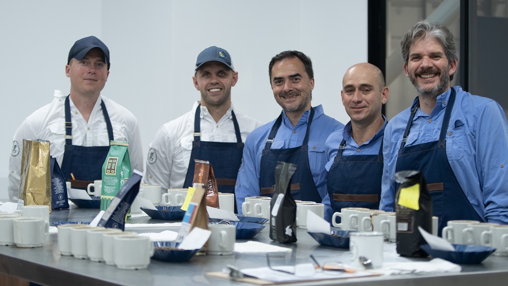 Cole and Adam with the GCC management team testing the company's coffee vs. other top brands