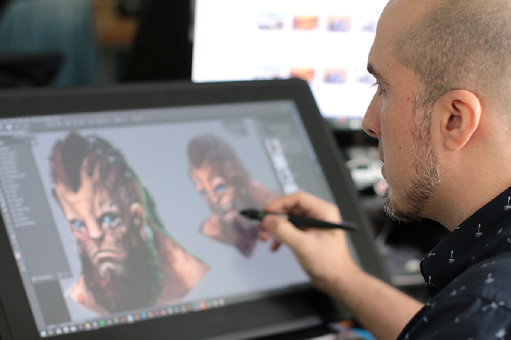 A PolygonUs artist works on a new video game character for one of their clients